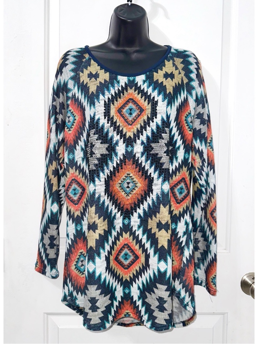 Vocal USA long-sleeve top features a vibrant, southwestern-inspired Aztec print